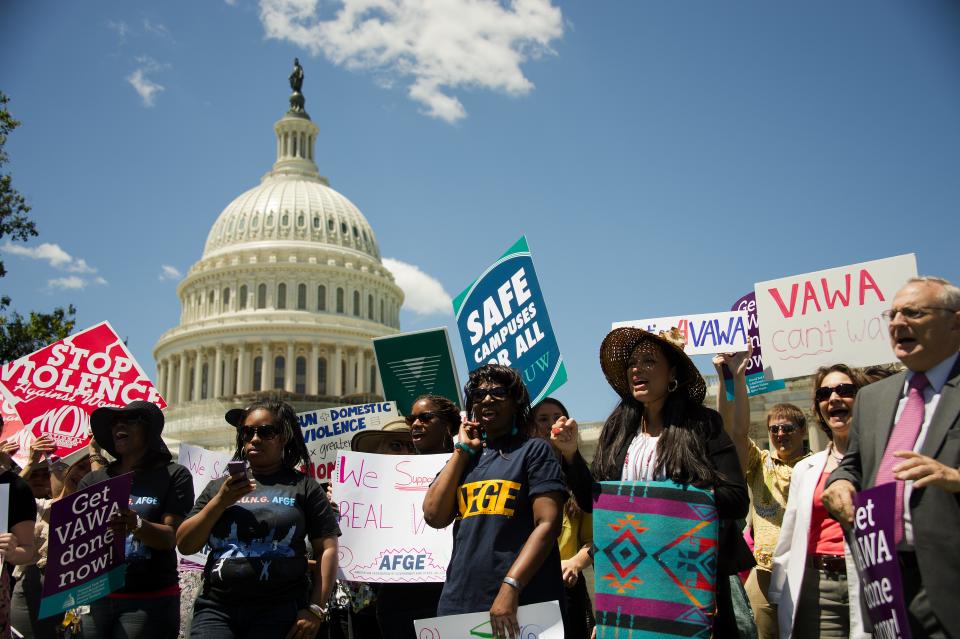 Supporters of the National Organization for Women (NOW) and the National Task Force to End Sexual Assault and Domestic Violence Against Women hold a rally for the reauthorization of the Violence Against Women Act (VAWA) outside the US Capitol in Washington (Credit: Getty Photos)