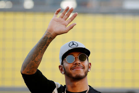 Mercedes' Lewis Hamilton of Britain attends a fan event. REUTERS/Toru Hanai