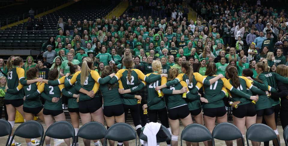 Ursuline players show support to fellow students by serenading them after winning the state title. Ursuline Academy defeated Magnificat, 3-1, on Nov. 12, 2022, at the Wright State Nutter Center to earn the Division I state volleyball championship.