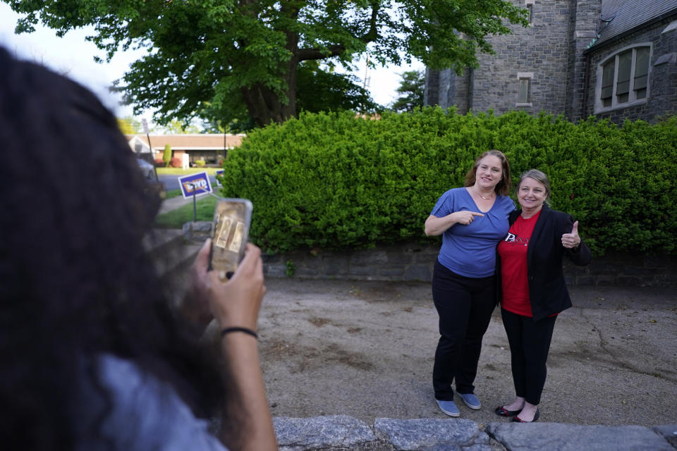 Heather Boyd, center, Democratic candidate for Pennsylvania House of Representatives, poses with supporters before voting at her polling place, Christ's Community Church, Tuesday, May 16, 2023, in Drexel Hill, Pa. (AP Photo/Matt Slocum)