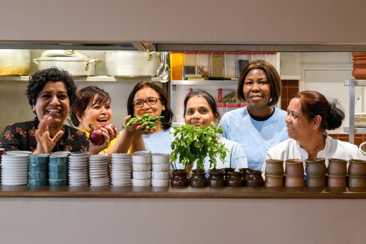 Chefs: Asma Khan, left, at Calcutta Canteen with Asha Pradhan, Uma Gurung, Rashmi Raut, Paulina Doniya and Shanta Awale