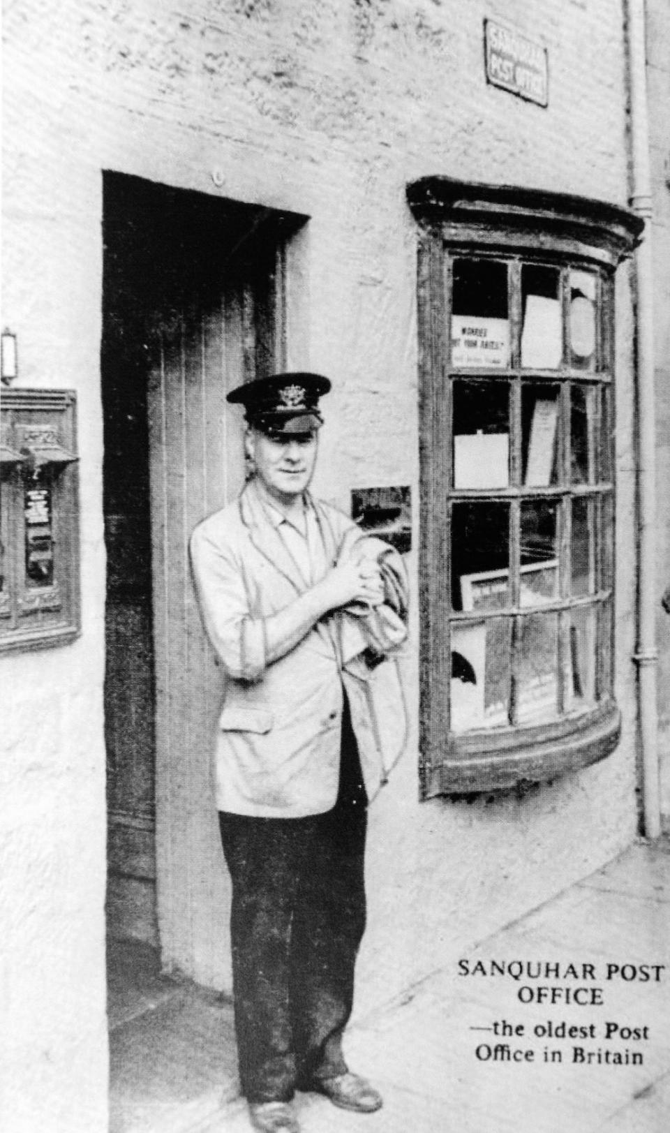 Postman Bob Morrison at Sanquhar Post Office in Dumfries and Galloway (Picture: SWNS)