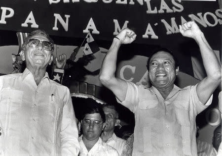 FILE PHOTO: Panama's newly appointed President Manuel Solis Palma stands next to his friend General Manuel Antonio Noriega who appointed him during a rally of 2,000 supporters. REUTERS/Beth Cruz/File Photo