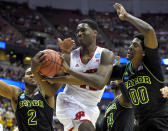 Wisconsin forward Nigel Hayes fights for a rebound against Baylor's Royce O'Neale (00) during the first half of an NCAA men's college basketball tournament regional semifinal, Thursday, March 27, 2014, in Anaheim, Calif. (AP Photo/Mark J. Terrill)