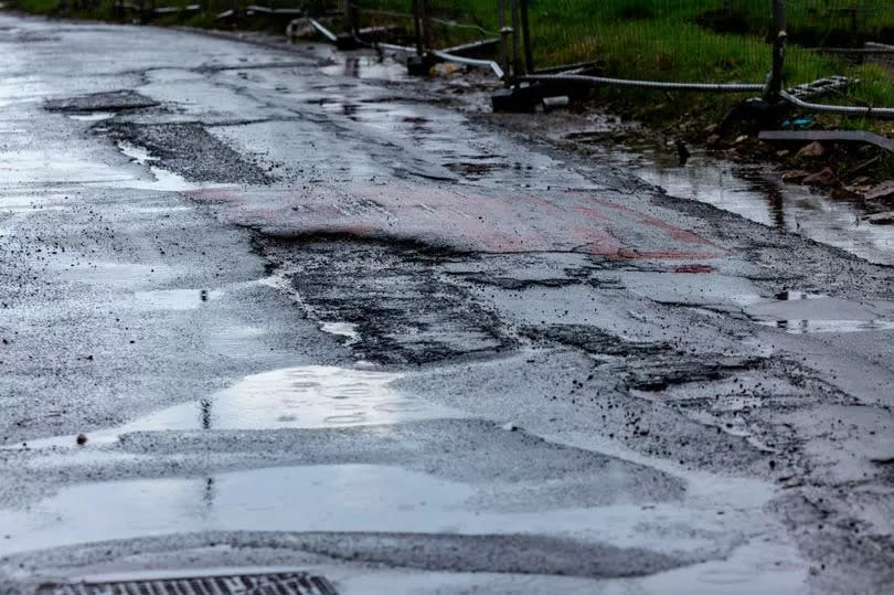 John says he has dealt with three punctures in just months because of the potholes on Sandy Lane (James Maloney/LancsLive)