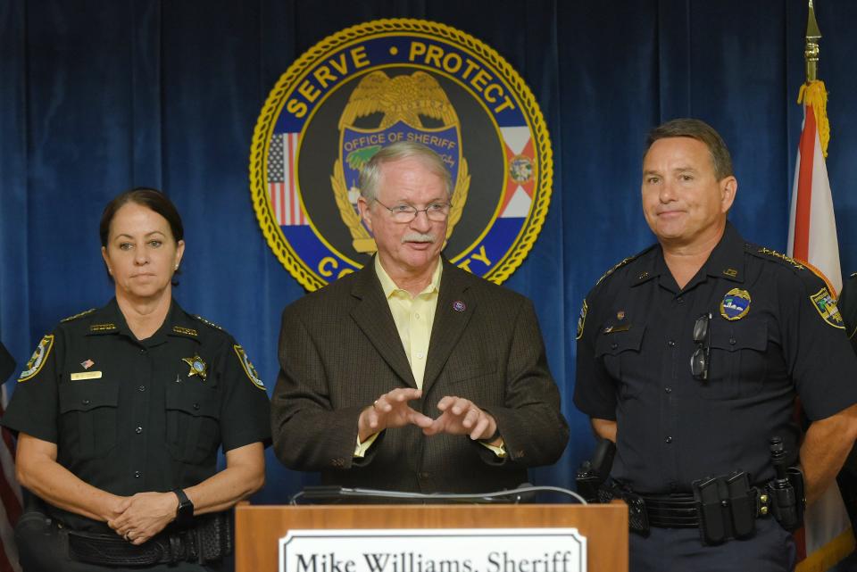 U.S. Rep. John Rutherford, flanked by Clay County Sheriff Michelle Cook and Jacksonville Sheriff Mike Williams, addresses the media about state and federal law enforcement support in 2021.