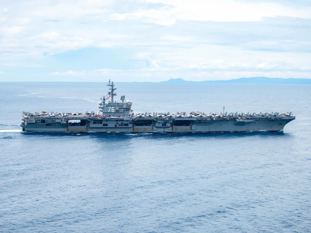 A US carrier and a pair of ships carrying F-35 stealth fighters are operating ne..