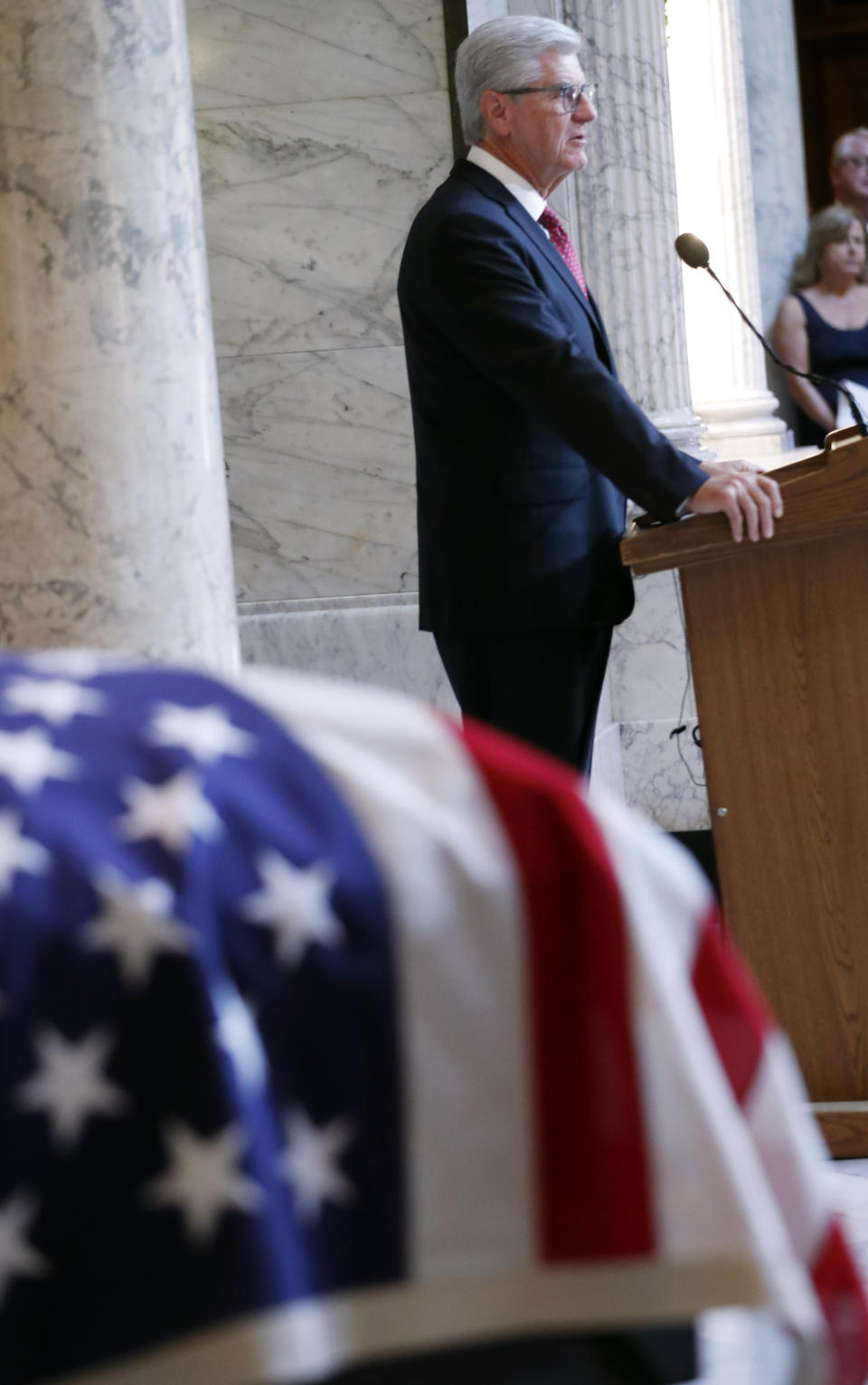 Mississippi Gov. Phil Bryant delivers remarks at the funeral of the late Republican senator Thad Cochran, in the Mississippi State Capitol rotunda in Jackson, Miss., Monday, June 3, 2019. Cochran was 81 when he died Thursday in a veterans' nursing home in Oxford, Miss. He was the 10th longest serving senator. (AP Photo/Rogelio V. Solis)