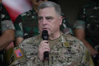 U.S. Chairman of the Joint Chiefs of Staff Gen. Mark Milley talks to the media after his meeting with Indonesian Armed Forces Chief Gen. Andika Perkasa at Indonesian military headquarters in Jakarta, Indonesia, Sunday, July 24, 2022. The Chinese military has become significantly more aggressive and dangerous over the past five years, the top U.S. military officer said during a trip to the Indo-Pacific that included a stop Sunday in Indonesia. (AP Photo/Achmad Ibrahim)