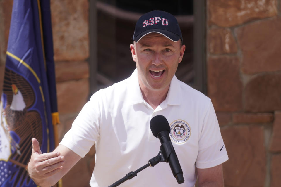 Utah Gov. Spencer Cox speaks during a news conference following a tour with U.S. Interior Secretary Deb Haaland to Bears Ears National Monument Thursday, April 8, 2021, near Blanding, Utah. (AP Photo/Rick Bowmer)