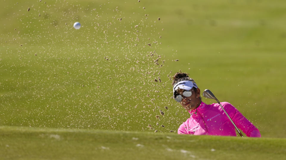 Maria Fassi hits out of a bunker on the first green during the final round of the LPGA Pelican Women's Championship golf tournament at Pelican Golf Club, Sunday, Nov. 14, 2021, in Belleair, Fla. (AP Photo/Steve Nesius)