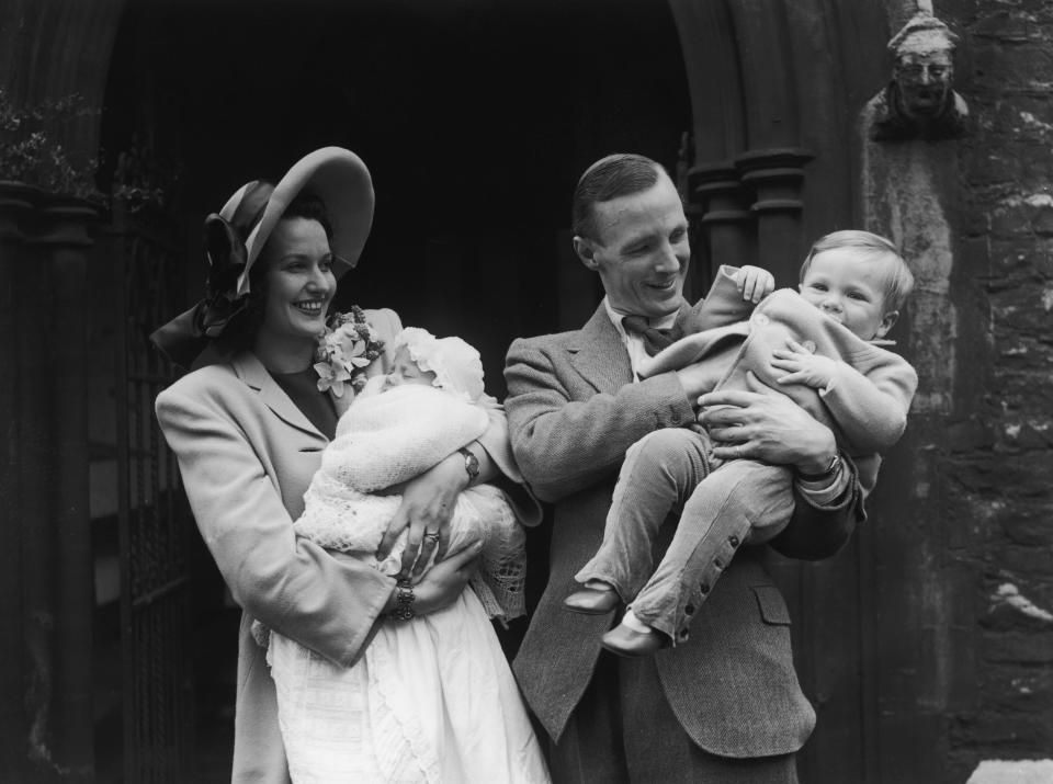 Judy Campbell  with her husband Lieutenant Commander David Birkin at the christening of their baby daughter, the future actress Jane Birkin.