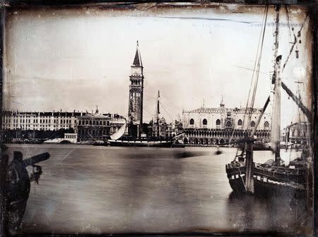 The Ducal Palace, the Zecca and the Campanile in Venice with moored ships in the foreground are seen in this handout photograph of a daguerreotype circa 1851, released in London March 18, 2015. REUTERS/K.& K. J. Jacobson/Handout via Reuters