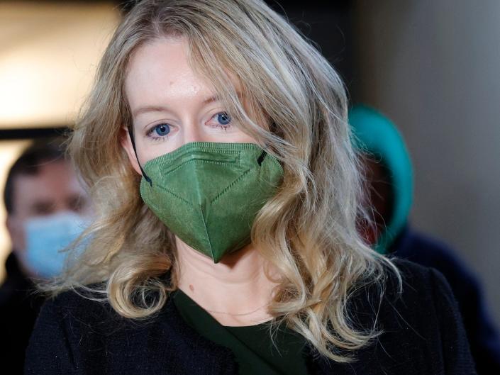 Theranos founder and former CEO Elizabeth Holmes arrives for her trial at the Robert F. Peckham Federal Building on December 07, 2021 in San Jose, California. Holmes is facing charges of conspiracy and wire fraud for allegedly engaging in a multimillion-dollar scheme to defraud investors with the Theranos blood testing lab services.