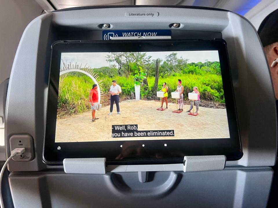 The Kindle Fire on the tablet holder.