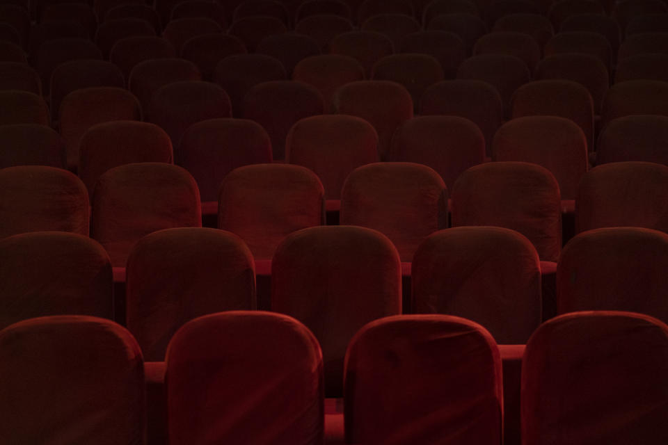 Empty seats are seen inside the Ariana Cinema in Kabul, Afghanistan on Thursday, Nov. 4, 2021. After seizing power three months ago, the Taliban ordered cinemas to stop operating. (AP Photo/Bram Janssen)