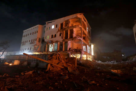 A damaged building is seen at the scene where a suicide car bomb exploded targeting a Mogadishu hotel in a business center in Maka Al Mukaram street in Mogadishu, Somalia. February 28, 2019. REUTERS/Feisal Omar