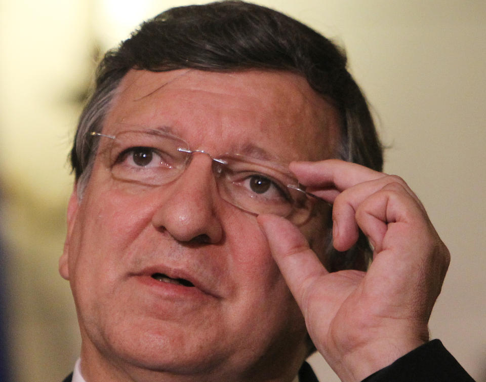 European Commission President Jose Manuel Barroso makes statements to the media at Maximos mansion in Athens, Thursday, July 26, 2012. International debt inspectors started new talks Thursday with the Greek government that will determine whether the country keeps receiving vital rescue loans or is forced to default and potentially leave the common European currency union. (AP Photo/Thanassis Stavrakis)