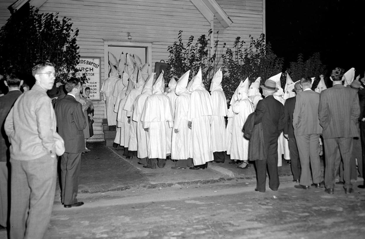 Many churches propped up white supremacist beliefs through pulpit rhetoric and segregationist policies. <a href="https://newsroom.ap.org/detail/KKKSUNDAYSERVICES/4674d3299be5da11af9f0014c2589dfb/photo?Query=church%20AND%20KKK&mediaType=photo&sortBy=arrivaldatetime:asc&dateRange=Anytime&totalCount=13&currentItemNo=0" rel="nofollow noopener" target="_blank" data-ylk="slk:AP Photo;elm:context_link;itc:0;sec:content-canvas" class="link ">AP Photo</a>
