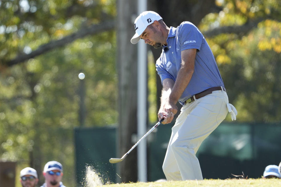 Troy Merritt hits from the rough onto the eighth green during the final round of the Sanderson Farms Championship golf tournament Sunday, Oct. 8, 2023, in Jackson, Miss. (AP Photo/Rogelio V. Solis)
