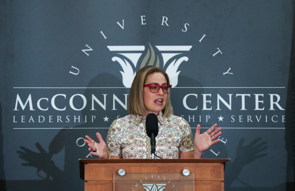 Arizona Sen. Kyrsten Sinema made remarks about bipartisanship as a guest of Sen. Mitch McConnell during an event at the McConnell Center on the campus of the University of Louisville in Louisville, Ky. on Sept. 26, 2022.  