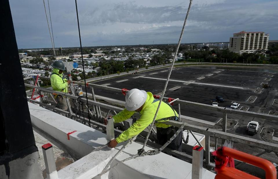 The transformation from gateway to destination point is getting closer as the Marriott Palmetto Resort and Spa nears completion and the expansion and renovation of the Bradenton Area Convention Center begins. Workers on the 8th floor complete the exterior of the resort.
