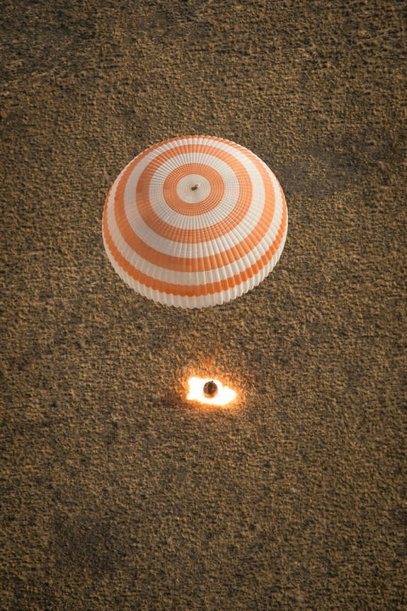 The Soyuz TMA-08M spacecraft carrying Russia's Pavel Vinogradov and Alexander Misurkin and NASA's Chris Cassidy lands in a remote area of Kazakhstan on Tuesday Sept. 10, 2013 though it was early Wednesday morning locally.