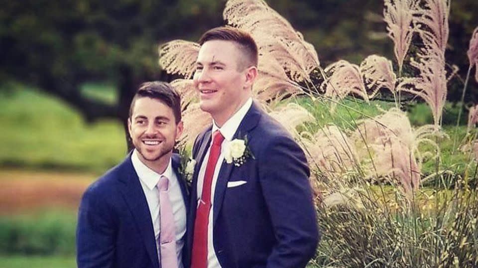Andrew Borg, left, and Stephen Heasley, are suing Vistaprint for sending them 'homophobic' pamphlets instead of the wedding programs they ordered. Source: Supplied