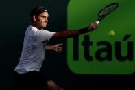 Mar 24, 2018; Key Biscayne, FL, USA; Roger Federer of Switzerland hits a backhand against Thanasi Kokkinakis of Australia (not pictured) on day five of the Miami Open at Tennis Center at Crandon Park. Mandatory Credit: Geoff Burke-USA TODAY Sports