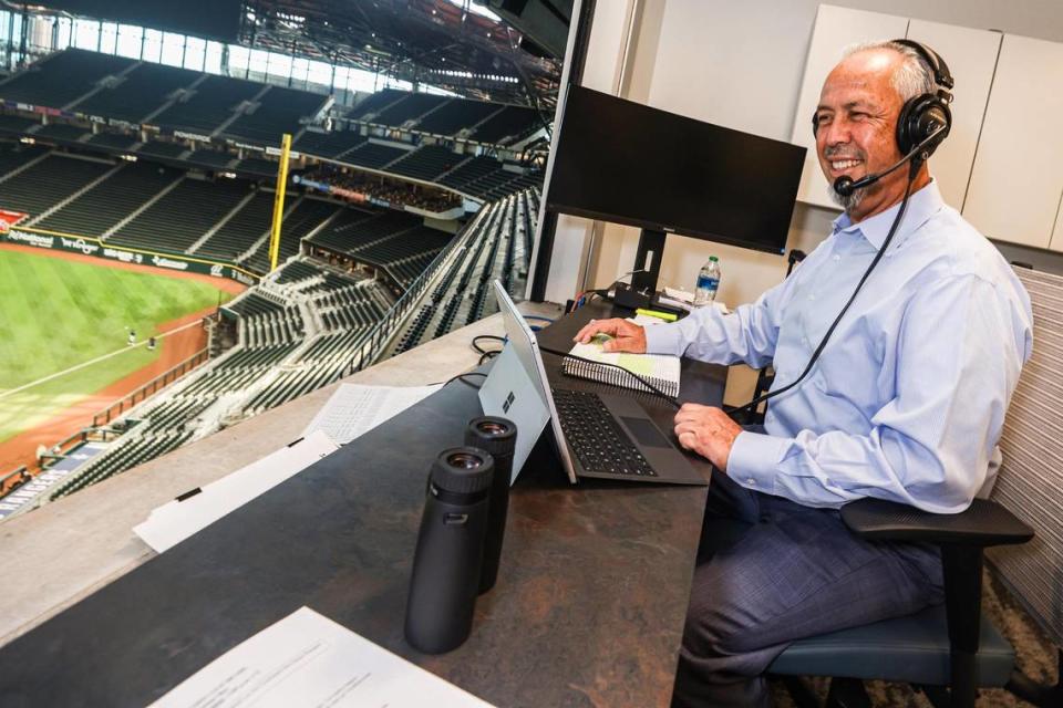 Eleno Ornelas works in the broadcast booth at Globe Life Field in Arlington, Texas on Wednesday, July 21, 2023. Ornelas is currently in his 22nd season and 19th as the lead play-by-play announcer.