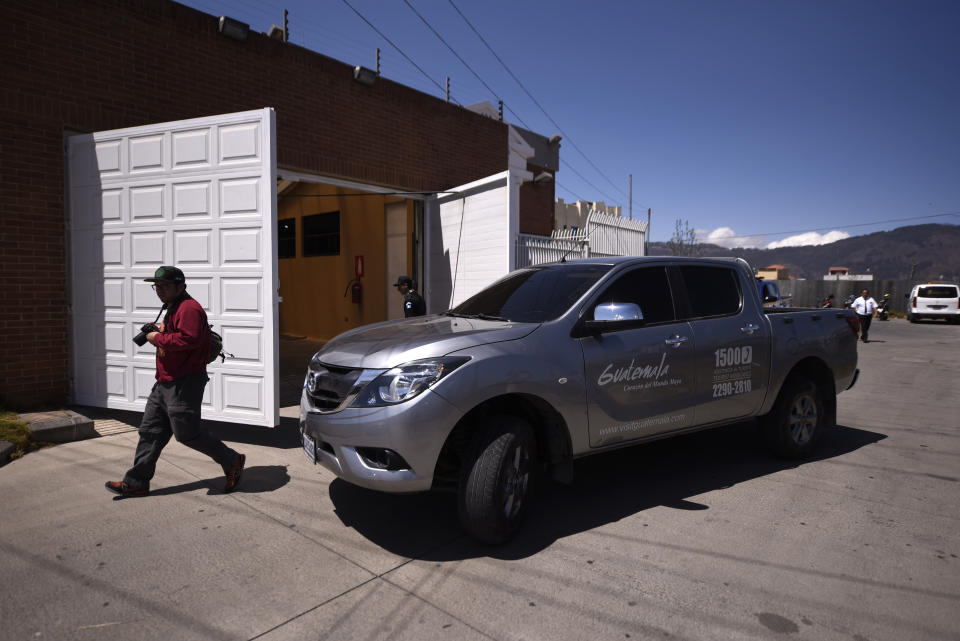 Relatives of late English tourist Catherine Shaw leaves the morgue aboard of a vehicle of the Guatemalan Tourist Institute, INGUAT, in Quetzaltenango, Guatemala, Tuesday, March 12, 2019. The body of the 23-year-old who was found dead near a highland lake popular with travelers showed signs of trauma but no apparent gunshot or stab wounds, a doctor performing an autopsy said Tuesday. (AP Photo/Santiago Billy)