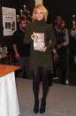 Her fashion sense gets all serious at this event in 2010 - she's a serious author, don't you know?