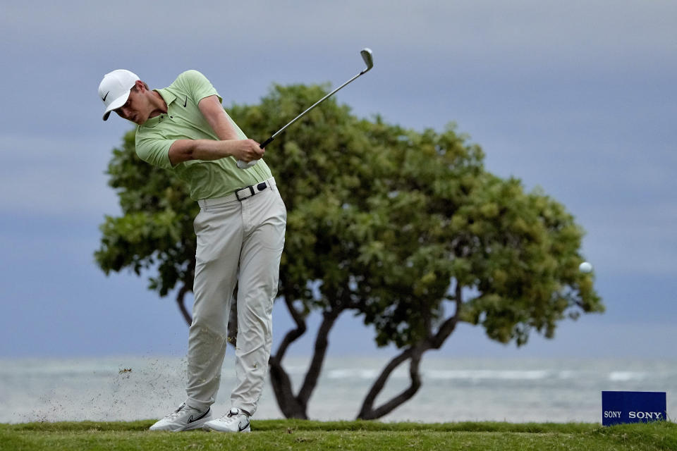 Cam Davis hits from the 17th tee during the first round of the Sony Open golf event, Thursday, Jan. 11, 2024, at Waialae Country Club in Honolulu. (AP Photo/Matt York)