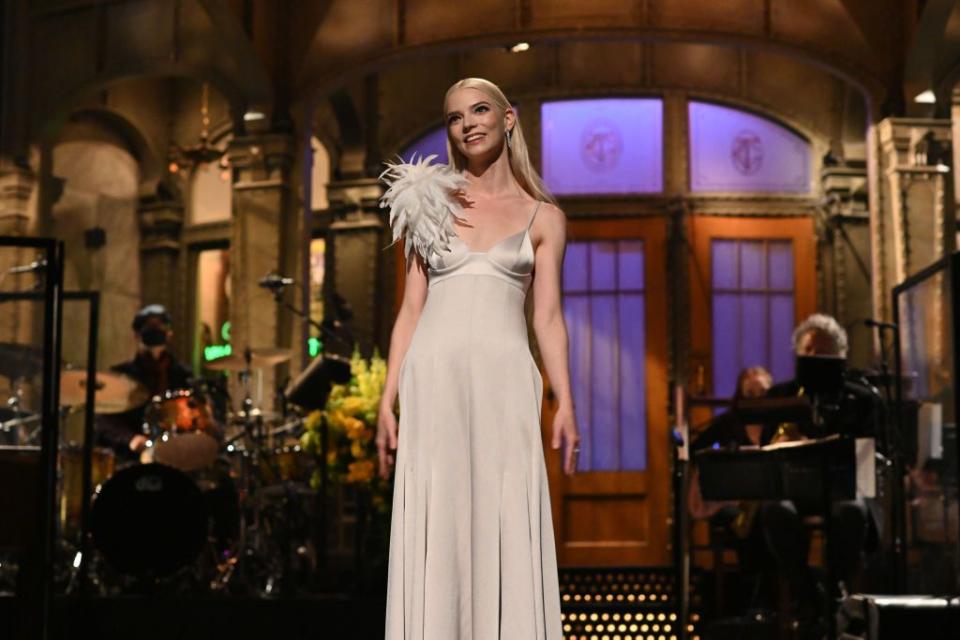 <p>For the Emma star's opening monologue, she wore a feather-embellished, silver Peter Do gown with Tiffany & Co jewellery. </p><p><a class="link " href="https://www.youtube.com/watch?v=DhSz9aPiBe0&ab_channel=SaturdayNightLive" rel="nofollow noopener" target="_blank" data-ylk="slk:WATCH ANYA TAYLOR-JOY'S MONOLOGUE HERE;elm:context_link;itc:0;sec:content-canvas">WATCH ANYA TAYLOR-JOY'S MONOLOGUE HERE</a></p>