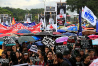 Protesters with placards gather during a protest at Luneta park, metro Manila, Philippines November 25, 2016, denouncing the burial of late dictator Ferdinand Marcos at the Libingan ng mga Bayani (Heroes' cemetery) last week. REUTERS/Romeo Ranoco