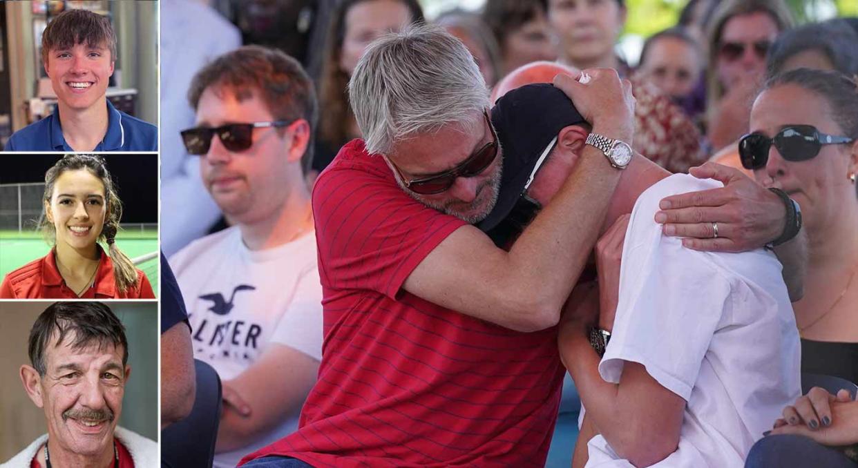 Barnaby Webber's father, David, consoles his other son, Charlie, at the vigil. (PA)