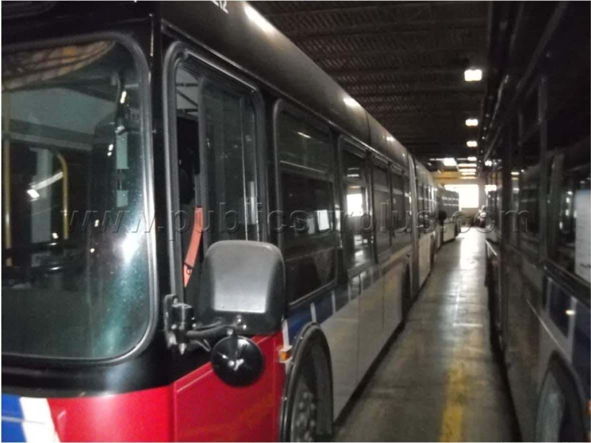 These articulated buses are being put up for sale by the municipality of St. Louis, Mo., and Ottawa city Coun. Catherine McKenney has volunteered to buy them to help out frustrated OC Transpo riders. (Metro St. Louis - image credit)