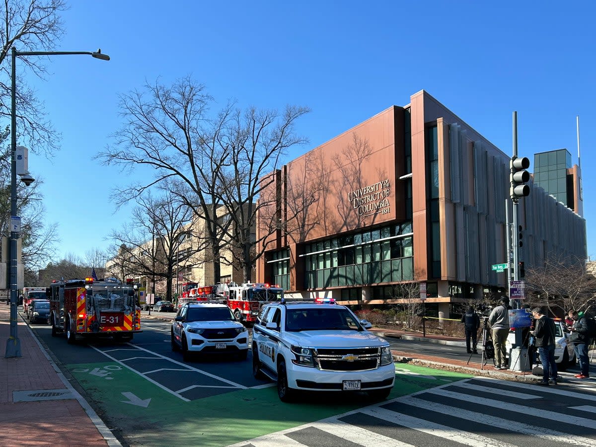 US Secret Service vehicles block access to a street leading to the Embassy of Israel in Washington, DC aftera man reportedly set  himself on fire (AFP via Getty Images)