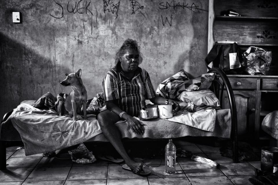Esther Yumbi having breakfast in her home in Kennedy Hill. Due to excessive alcohol consumption she has been diagnosed with diabetes, one of the biggest killers of aboriginal people. Esther now has dialyses treatments to cope with her ailment.  Broome, Western Australia. (Photograph by Ingetje Tadros/Diimex)