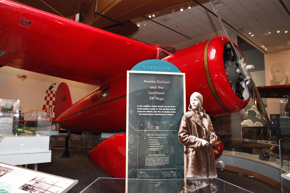 FILE - Amelia Earhart's plane is seen at the Smithsonian's National Air and Space Museum in Washington, Tuesday, Nov. 16, 2010, after an overhaul of one of the museum's original galleries, the "Pioneers of Flight" exhibit. (AP Photo/Jacquelyn Martin, File)