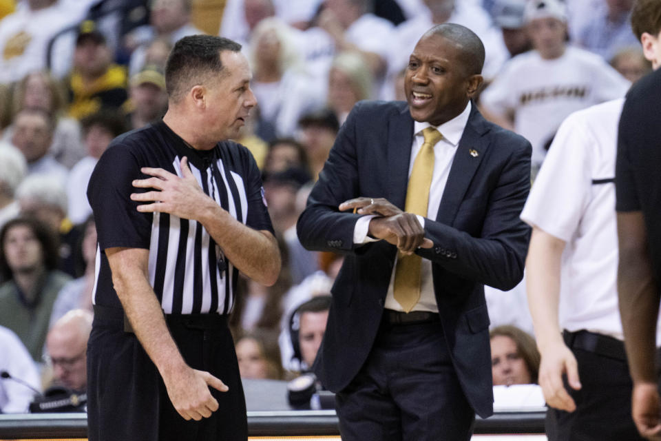 Missouri head coach Dennis Gates discusses a call with the official during the second half of an NCAA college basketball game against Mississippi Saturday, March 4, 2023, in Columbia, Mo. Missouri won 82-77. (AP Photo/L.G. Patterson)