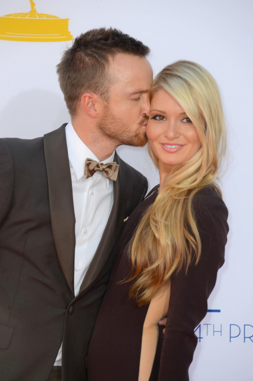 At their shared bachelor-bachelorette party in Las Vegas in May, Paul <a href="http://www.huffingtonpost.com/2013/05/20/aaron-paul-fiancee_n_3307597.html" target="_blank">dished up a cake</a>, designed to look like the <a href="https://twitter.com/aaronpaul_8/status/256466339722579968" target="_blank">Paris street</a> where he proposed in 2011, decorated with the words, "My pretty bird, thank you for loving me."