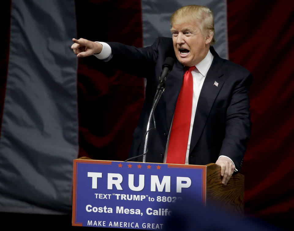 FILE - In this April 28, 2016 file photo, Republican presidential candidate Donald Trump speaks during a rally in Costa Mesa, Calif. California Republican leaders are gathering this weekend Sept. 6 - 8, 2019, to map out an election strategy in an increasingly Democratic state that Trump lost by over 4 million votes in 2016. The outlook is challenging. Democrats control every statewide office and both chambers of the Legislature. (AP Photo/Chris Carlson, File)