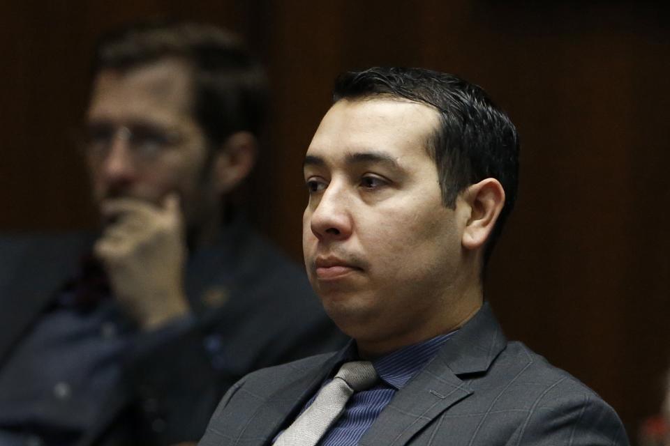 FILE - In this Tuesday, Jan. 9, 2018 file photo, then-Rep. Tony Navarrete, D-Phoenix, waits with Arizona House members receiving mandatory sexual harassment and other ethics issues training on the House floor at the capitol, in Phoenix. Currently, an Arizona State Senator, Navarrete has been arrested on suspicion of charges accusing him of sexual conduct with a minor, police said Friday, Aug. 6, 2021. (AP Photo/Ross D. Franklin, File)