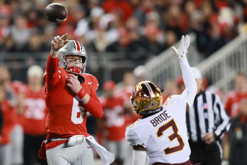 Ohio State Buckeyes coach Ryan Day declined to say if quarterback Kyle McCord (L) will play in the Cotton Bowl, when asked about his status Sunday at a news conference. File Photo by Aaron Josefczyk/UPI