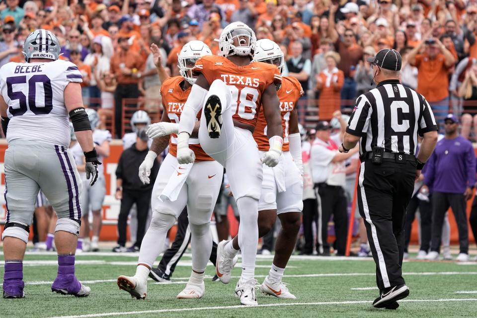Texas edge rusher Barryn Sorrell reacts after a first-half sack of Kansas State quarterback Will Howard on Nov. 4. It was his second sack of the game, on fourth-and-goal in overtime, and saved the Longhorns' 33-30 win.