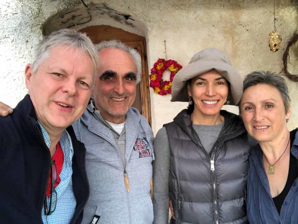 Chris and Galina with new friends in Ikaria. PA REAL LIFE