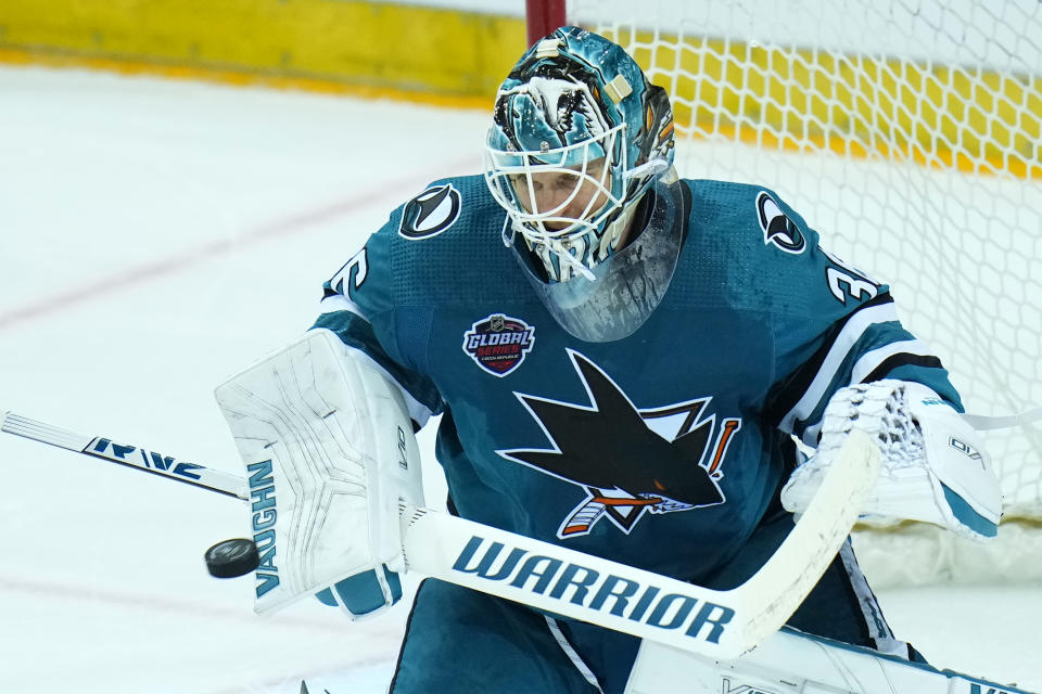 San Jose's goaltender Kaapo Kahkonen makes a save during the NHL hockey game between San Jose Sharks and Nashville Predators played in Prague, Czech Republic, Saturdday, Oct. 8, 2022. (AP Photo/Petr David Josek)