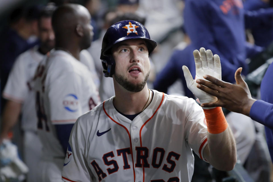 Houston Astros <a class="link " href="https://sports.yahoo.com/mlb/players/10480/" data-i13n="sec:content-canvas;subsec:anchor_text;elm:context_link" data-ylk="slk:Kyle Tucker;sec:content-canvas;subsec:anchor_text;elm:context_link;itc:0">Kyle Tucker</a> collects high fives in the dugout as they celebrate Tucker’s home run against the Cleveland Guardians during the seventh inning of a baseball game Wednesday, May 1, 2024, in Houston. (AP Photo/Michael Wyke)
