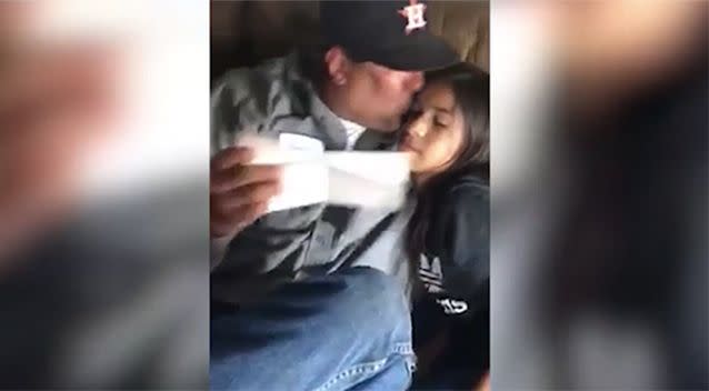 The stepfather embraces the 11-year-old at the end of the moving video. Source: Angel Trevino/ Facebook